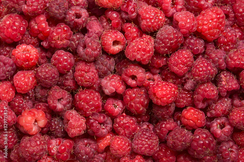 Raspberry red ripe berry background