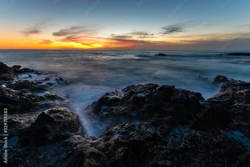 Beautiful sunset over the rocky coast of Fuerteventura