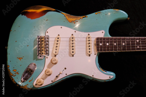 close up detail of electric guitar Body heavy Relic with selective focus.