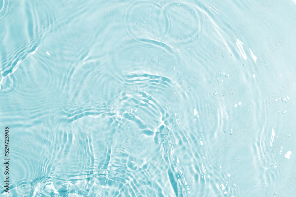 texture of splashing clean water on blue background texture of splashing clean water on blue background