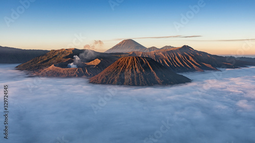 Beautiful view of Bromo, Batok and Semeru volcano with sea of fog at sunrise time in Java, Indonesia.