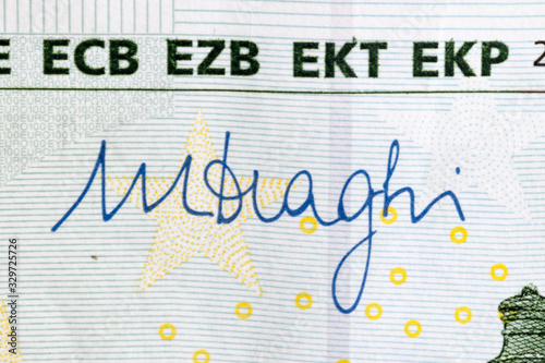 Mario Draghi's signature on 100 Euro banknote. Mario Draghi is president of the European Central Bank. photo