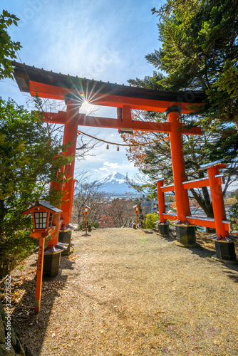View of red gate shrine at Chureito pagoda in Fujiyoshida, Japan.