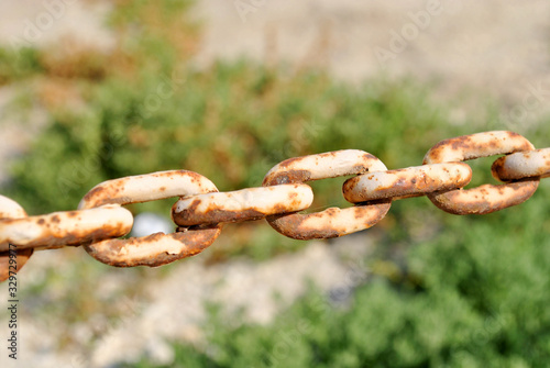Vintage chain, old rusty steel close up