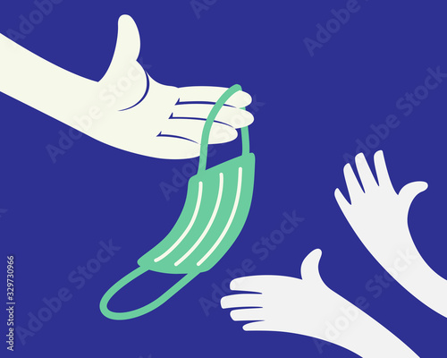 Close up of hand giving protective face mask