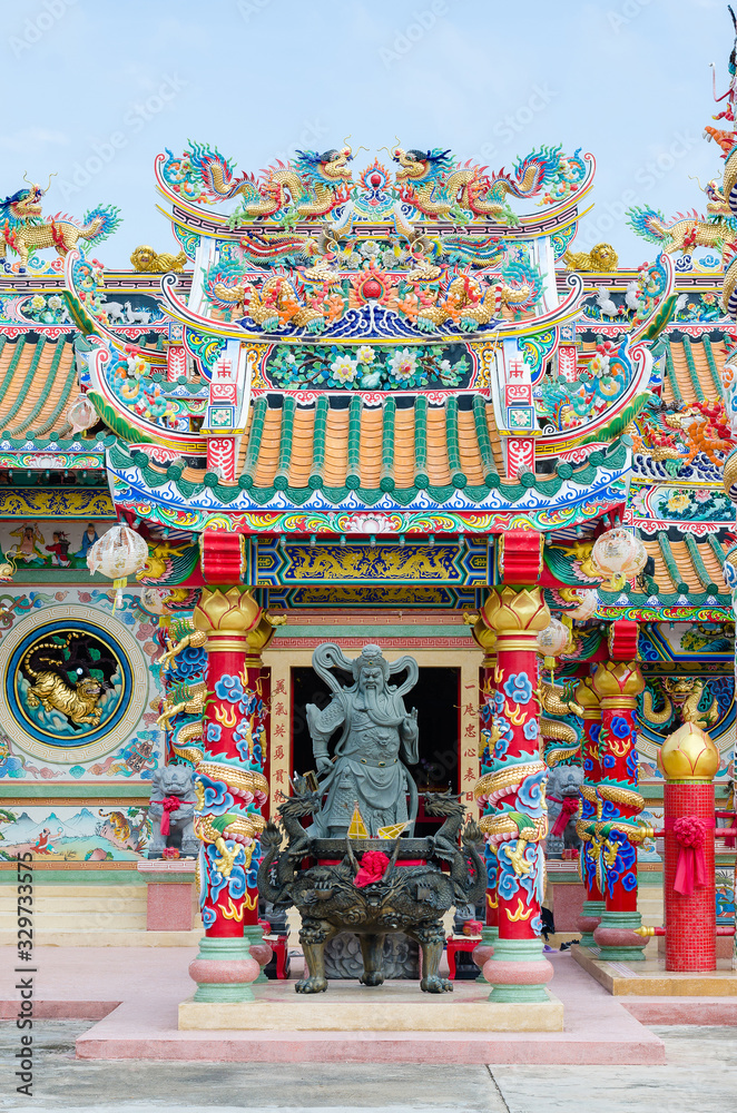 Chinese Shrine Decorate with Colorful Ornament Art on Rooftop and Building.