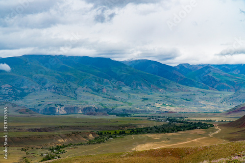 Background image of a mountain landscape. Russia, Siberia, Altai