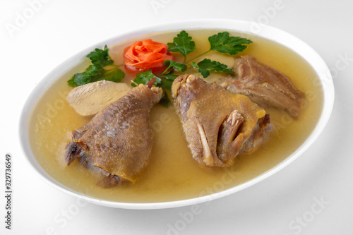Jellied of different types of meat, beef, pork and poultry. Jelly from broth and vegetables. Banquet festive dishes. Gourmet restaurant menu. White background.