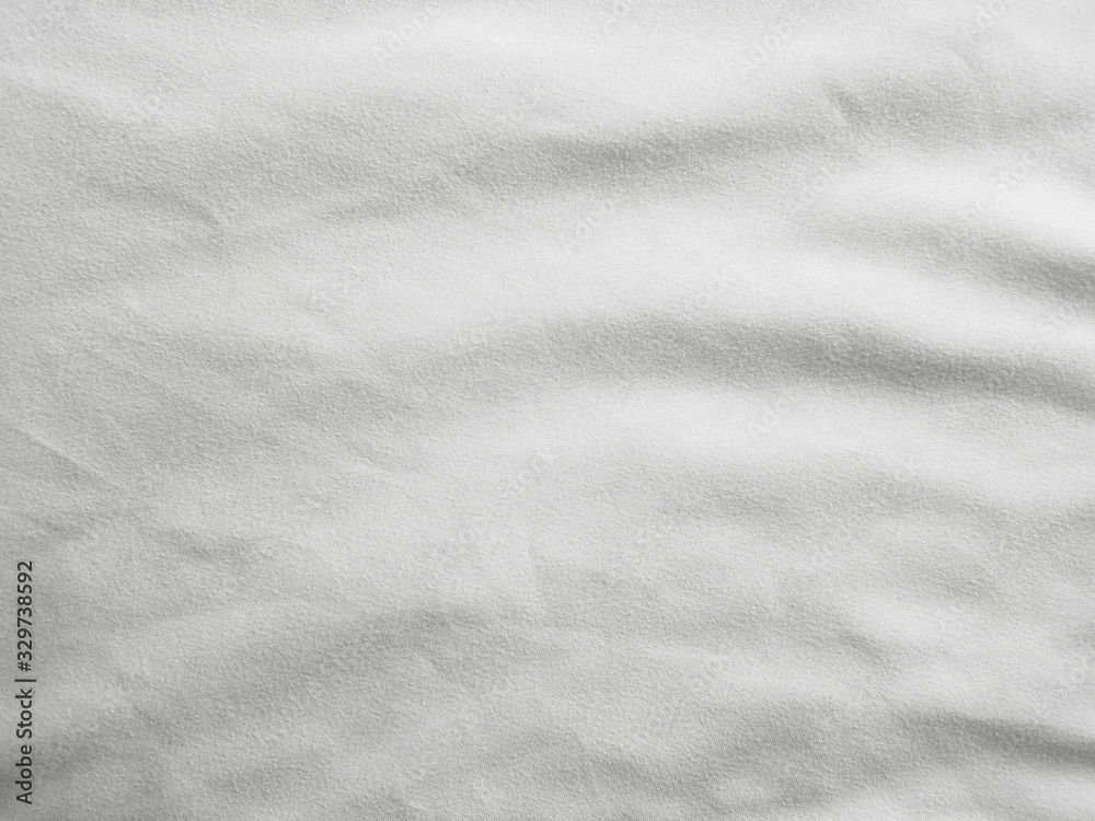 Naklejka premium Soft white wrinkled fabric background