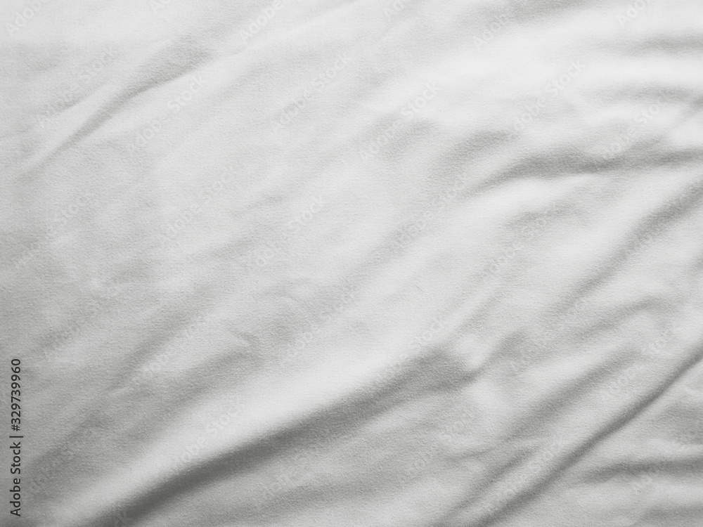 Obraz premium Soft white wrinkled fabric background