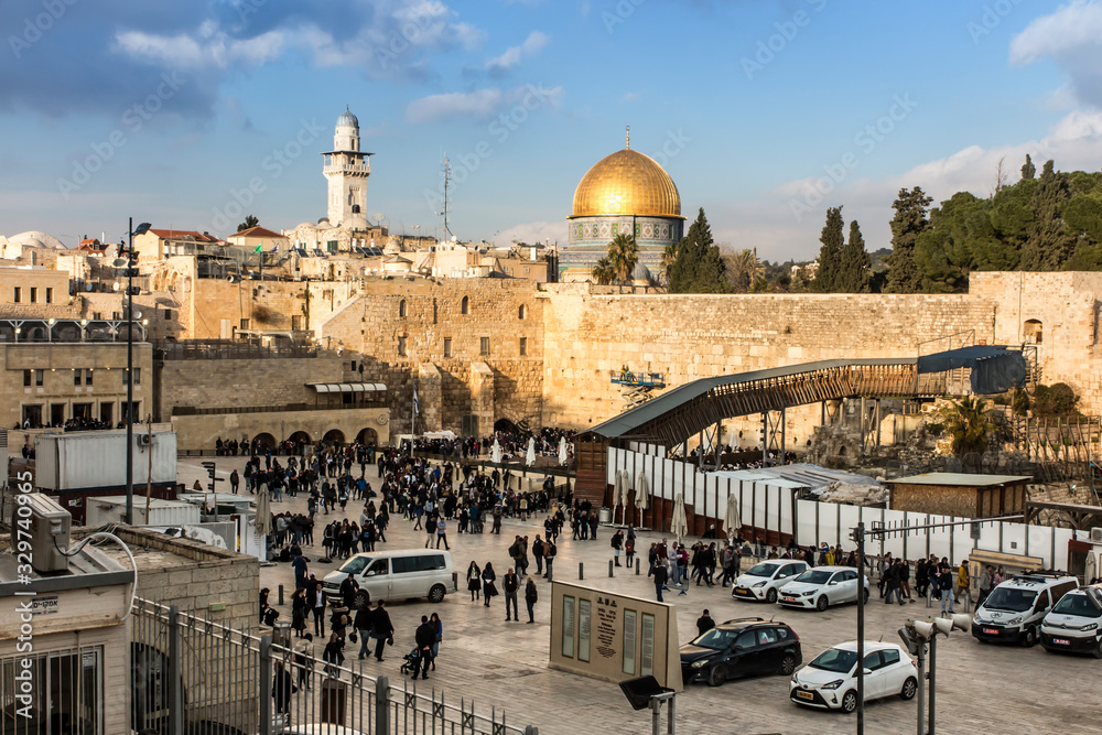 Al-Aqsa Mosque, the shrine of Islam in Jerusalem. Dome of the Rock, located on the Temple Mount in the Old Town, in the foreground a wailing wall