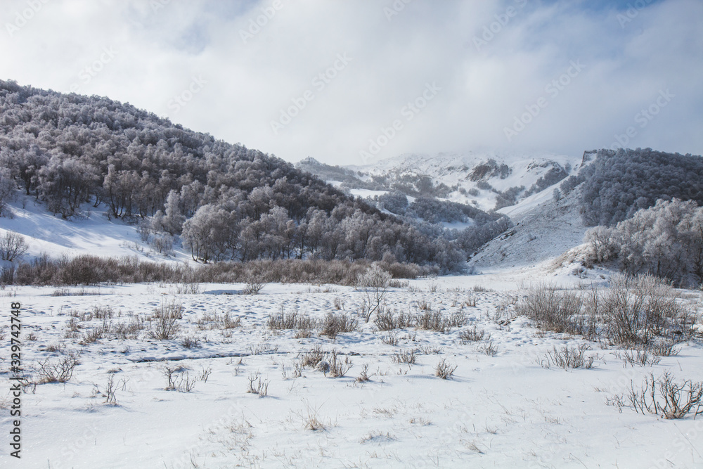 Caucasus Mountains winter landscape. Karachay-Cherkessia, Russia