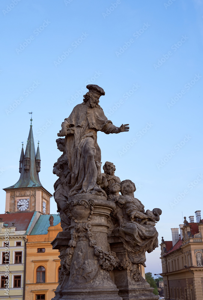 Sculpture of Saint Ivo in Prague - patron of beggars and poor people in city. Photo of colorful European city of Prague in Czech Republic daytime, month of may 2019, travel in tourist place.