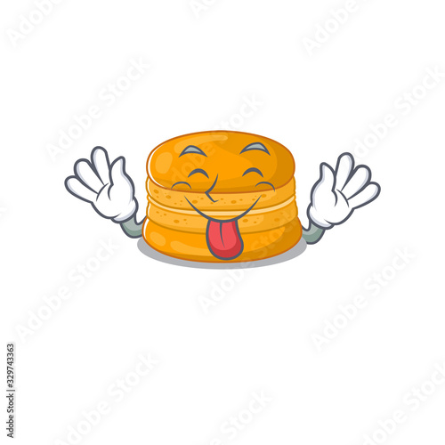 Funny face orange macaron mascot design style with tongue out