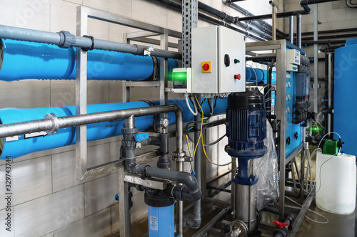 Automatic treatment and filtration of water on factory for production of purified drinking water.