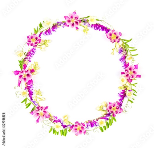 round flower frame wreath of garden flowers isolated on white background, top view