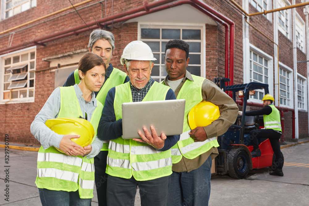 order-picker-and-team-with-laptop-stock-photo-adobe-stock