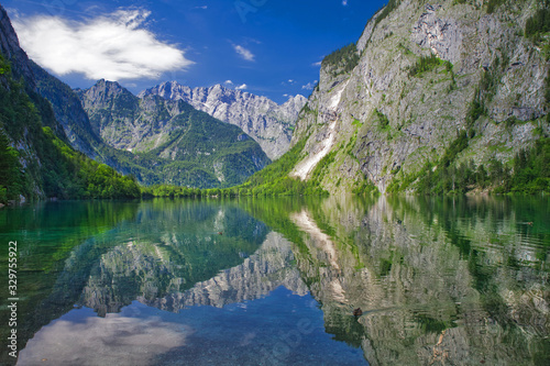Fototapeta Naklejka Na Ścianę i Meble -  lake Obersee with reflections and view to the alps mountains with ducks