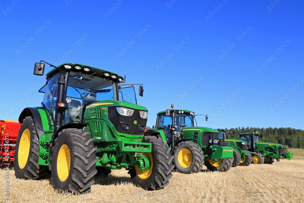 Line up of John Deere Agricultural Tractors. Illustrative Editorial