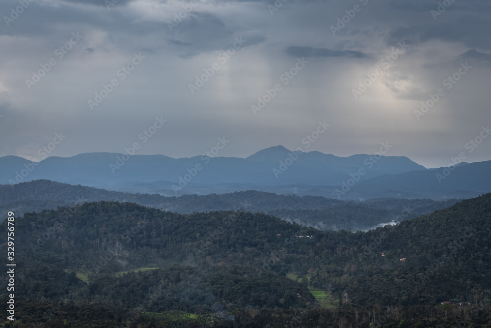 Misty mountains range with amazing sky