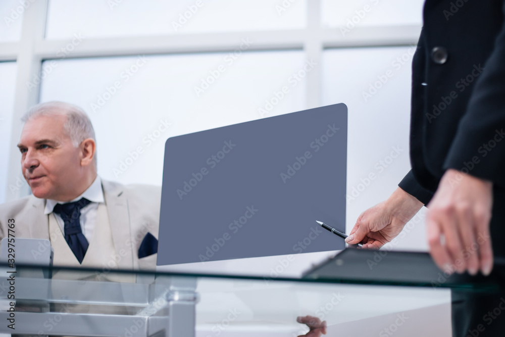 business partners sitting at the negotiating table business partners sitting at the negotiating table