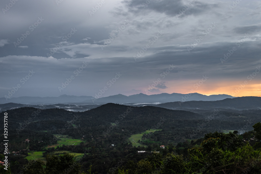 Obraz premium Misty mountains range with amazing sky