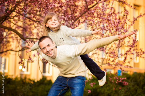 Happy father and child spending time outdoors