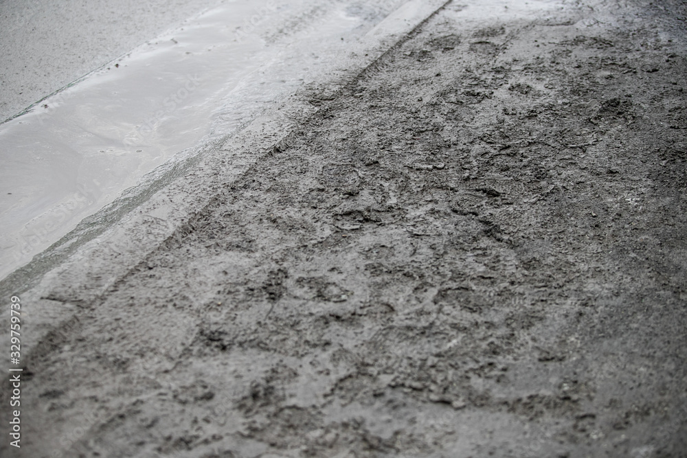 Road pits in the city in the spring after the snow melts. Problem of roads and asphalt in the city. Road pits in the city in the spring after the snow melts. Problem of roads and asphalt in the city.