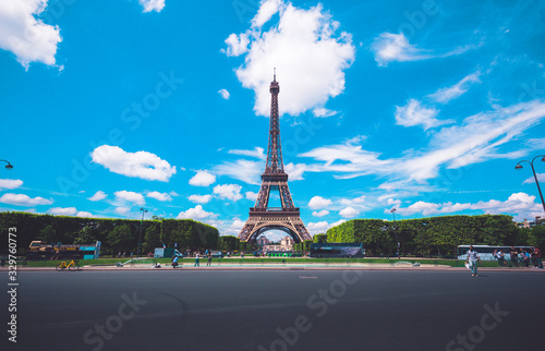 Day view of Eiffel tower on a cloudy day from the front