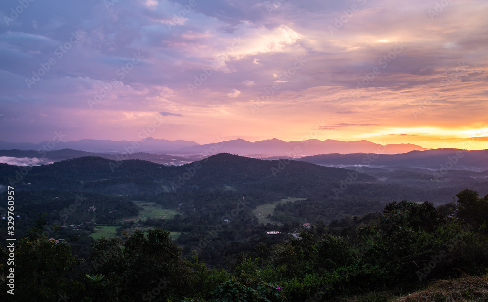 Obraz premium Misty mountains range with amazing sky