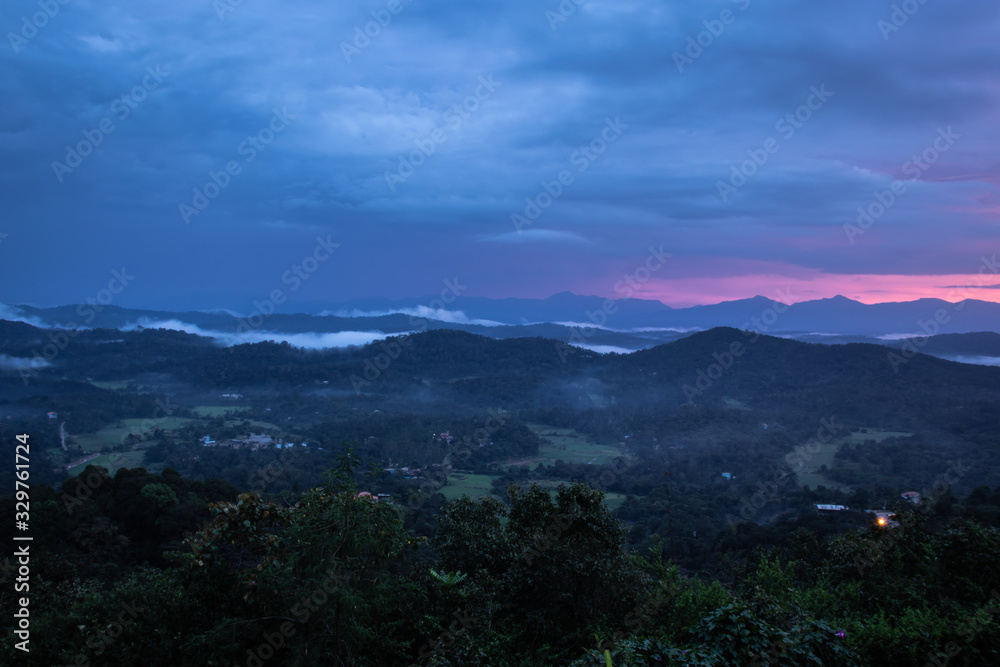 Obraz premium Misty mountains range with amazing sky