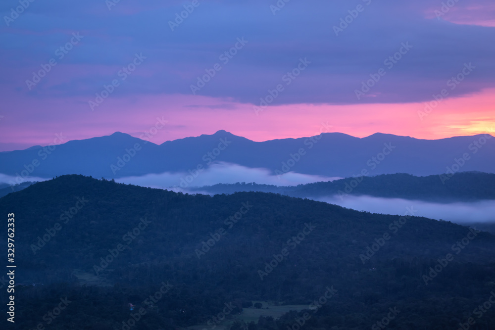 Misty mountains range with amazing sky Misty mountains range with amazing sky