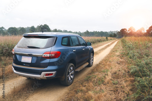 Schilderij op canvas Adventure 4wd car explore field area road trip travel for new experience