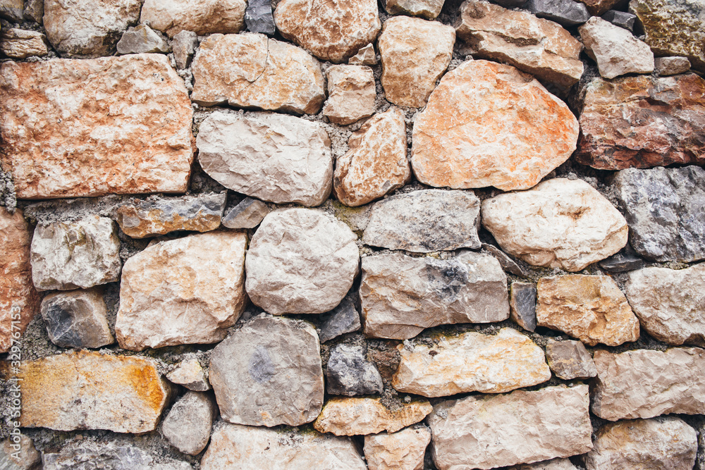 Wall of large natural stones. Wall of large natural stones.