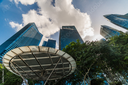 Canvas Print Looking up in Singapore at tall buildings, one of the most developed parts of As