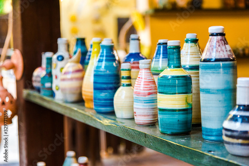 Beautiful handmade pottery bottles. Arts / craftmaship concept. photo