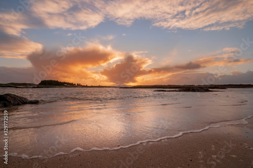 small wave rolling in at Arisaig in Scotland
