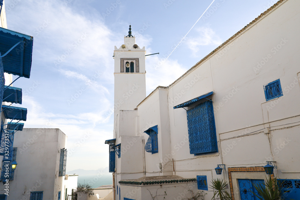 Sunset on the minaret of the mosque of Sidi Bou Said in Tunisia
