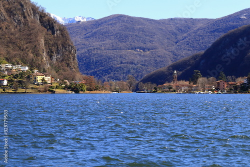 Vista dello stretto di Lavena, Ponte Tresa, Varese, Italia con lago di Lugano e montagne photo