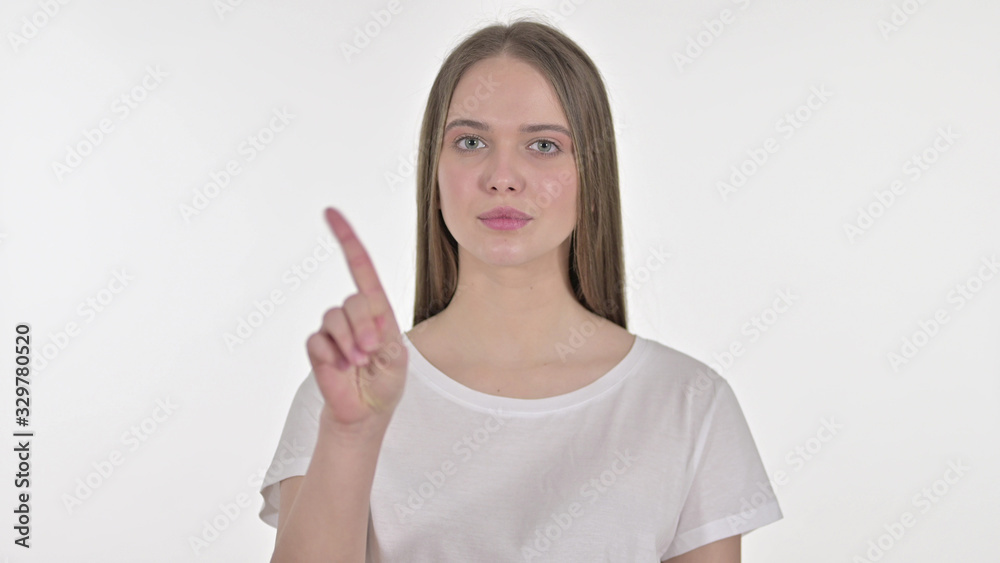 Portrait of Beautiful Young Woman saying No with Finger Sign Portrait of Beautiful Young Woman saying No with Finger Sign