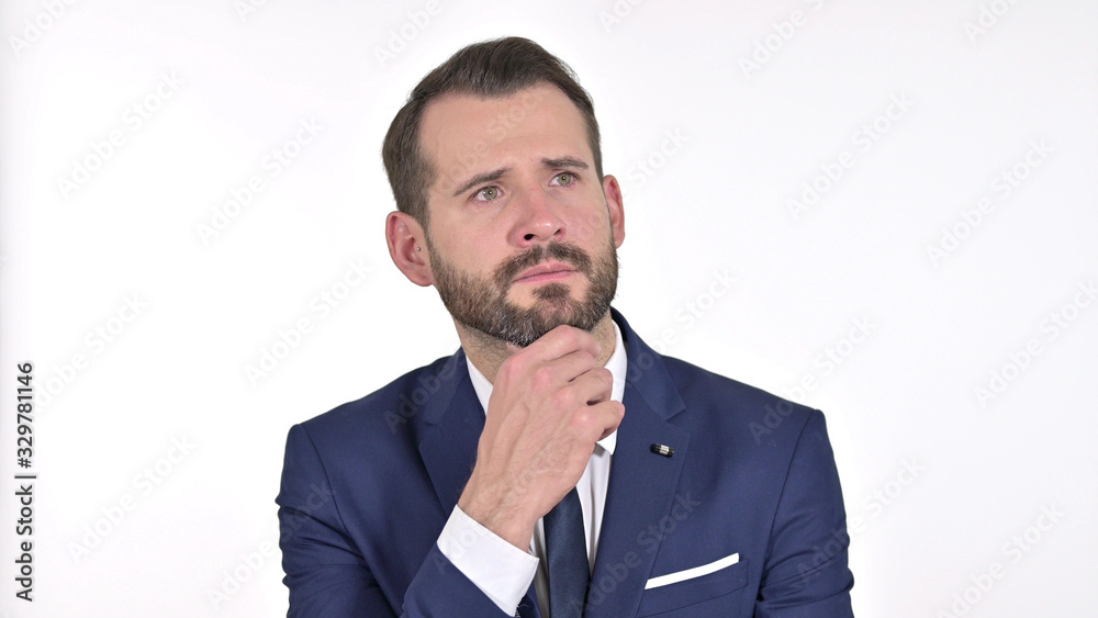 Portrait of Thoughtful Young Businessman Thinking and getting Idea, White Background Portrait of Thoughtful Young Businessman Thinking and getting Idea, White Background