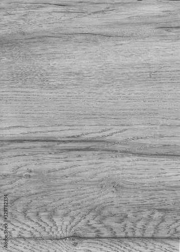 Fototapeta Naklejka Na Ścianę i Meble -  A Grey wooden texture with natural patterns. Design for floor, walls, cases, bags, foil and packaging