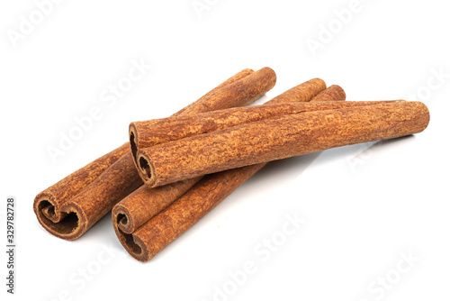 Cinnamon sticks isolated on white background closeup
