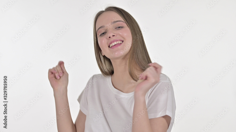 Happy Beautiful Woman Dancing to Music, White Background Happy Beautiful Woman Dancing to Music, White Background