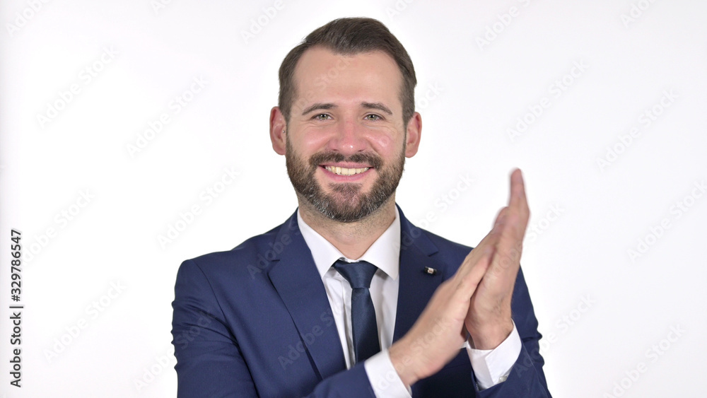 Portrait of Cheerful Young Businessman Clapping, White Background Portrait of Cheerful Young Businessman Clapping, White Background