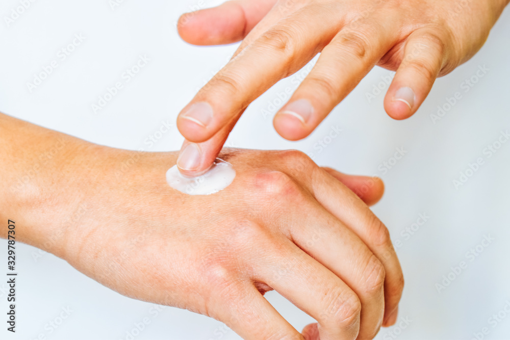 Skin care concept with soft cream for sensuality woman hands. Close up woman hands isolated on white background. Skin care concept with soft cream for sensuality woman hands. Close up woman hands isolated on white background.