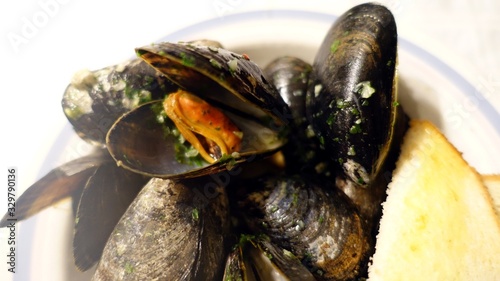mussels with toasted bread  salt  pepper and parsley