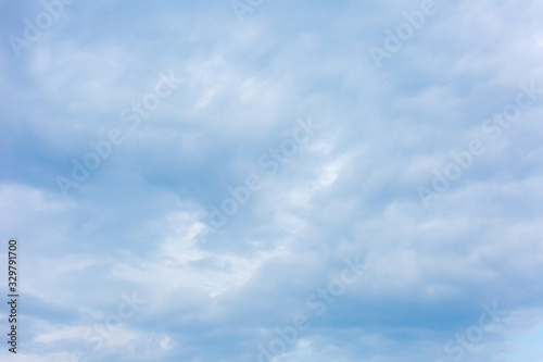 Thick clouds in the sky. Cloudy weather with clouds and clouds. On the sky clouds.