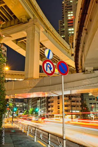 Photos Road sign with a multilevel stack interchange in Shinjuku district, Tokyo
