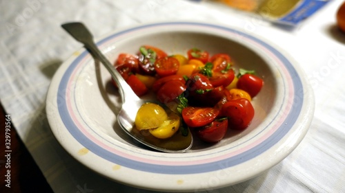 cherry tomato salad with extra virgin olive oil  salt and basil